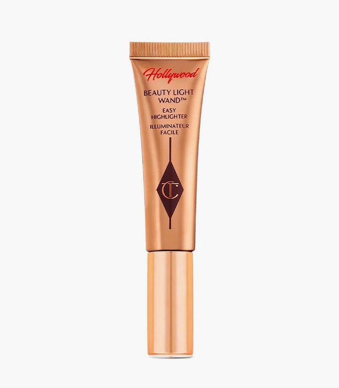 Tilbury Spotlight, Beauty Light Wand 5ml, Charlotte Tilbury Highlighter, liquid glow highlighter, easy highlighter wand, champagne highlighter, dewy skin makeup, radiant glow makeup, Charlotte Tilbury makeup, Hollywood glow highlighter, luxury liquid highlighter - Makeupstashpk