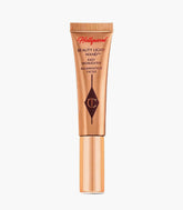 Tilbury Spotlight, Beauty Light Wand 5ml, Charlotte Tilbury Highlighter, liquid glow highlighter, easy highlighter wand, champagne highlighter, dewy skin makeup, radiant glow makeup, Charlotte Tilbury makeup, Hollywood glow highlighter, luxury liquid highlighter - Makeupstashpk